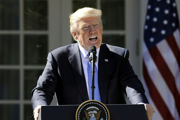 US President Donald Trump holds a joint press conference with Greek Prime Minister Alexis Tsipras in the Rose Garden at the White House in Washington, DC on October 17, 2017. / AFP PHOTO / Jason Connolly        (Photo credit should read JASON CONNOLLY/AFP/Getty Images)