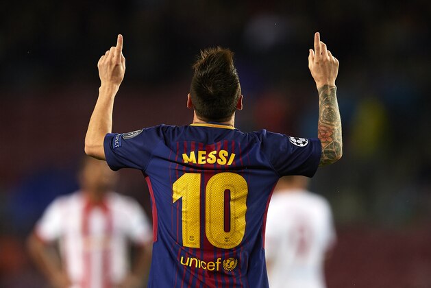 BARCELONA, SPAIN - OCTOBER 18:  Lionel Messi of Barcelona celebrates scoring his team's second goal during the UEFA Champions League group D match between FC Barcelona and Olympiakos Piraeus at Camp Nou on October 18, 2017 in Barcelona, Spain.  (Photo by Manuel Queimadelos Alonso/Getty Images)