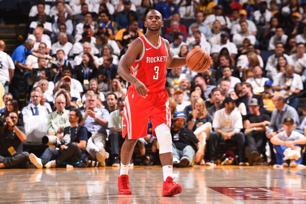 OAKLAND, CA - OCTOBER 17: Chris Paul #3 of the Houston Rockets handles the ball against the Golden State Warriors on October 17, 2017 at ORACLE Arena in Oakland, California. NOTE TO USER: User expressly acknowledges and agrees that, by downloading and or using this photograph, user is consenting to the terms and conditions of Getty Images License Agreement. Mandatory Copyright Notice: Copyright 2017 NBAE (Photo by Noah Graham/NBAE via Getty Images)
