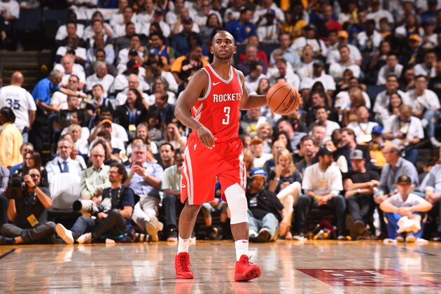 OAKLAND, CA - OCTOBER 17: Chris Paul #3 of the Houston Rockets handles the ball against the Golden State Warriors on October 17, 2017 at ORACLE Arena in Oakland, California. NOTE TO USER: User expressly acknowledges and agrees that, by downloading and or using this photograph, user is consenting to the terms and conditions of Getty Images License Agreement. Mandatory Copyright Notice: Copyright 2017 NBAE (Photo by Noah Graham/NBAE via Getty Images)