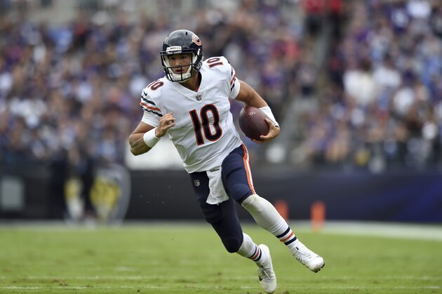 Chicago Bears quarterback Mitchell Trubisky rushes the ball in the first half of an NFL football game against the Baltimore Ravens, Sunday, Oct. 15, 2017, in Baltimore. (AP Photo/Gail Burton)