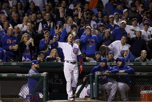 Chicago Cubs' Javier Baez celebrates after hitting his second home run during the fifth inning of Game 4 of baseball's National League Championship Series against the Los Angeles Dodgers, Wednesday, Oct. 18, 2017, in Chicago. (AP Photo/Matt Slocum)