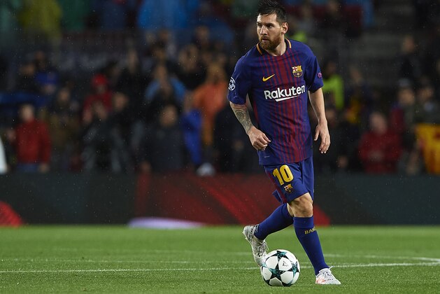 BARCELONA, SPAIN - OCTOBER 18:  Lionel Messi of Barcelona in action during the UEFA Champions League group D match between FC Barcelona and Olympiakos Piraeus at Camp Nou on October 18, 2017 in Barcelona, Spain.  (Photo by Manuel Queimadelos Alonso/Getty Images)