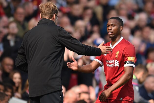 Liverpool's German manager Jurgen Klopp (L) shakes hands with Liverpool's English striker Daniel Sturridge as he is substituted during the English Premier League football match between Liverpool and Crystal Palace at Anfield in Liverpool, north west England on August 19, 2017. / AFP PHOTO / Oli SCARFF / RESTRICTED TO EDITORIAL USE. No use with unauthorized audio, video, data, fixture lists, club/league logos or 'live' services. Online in-match use limited to 75 images, no video emulation. No use in betting, games or single club/league/player publications.  /         (Photo credit should read OLI SCARFF/AFP/Getty Images)
