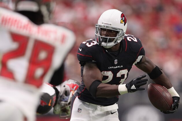 GLENDALE, AZ - OCTOBER 15:  Running back Adrian Peterson #23 of the Arizona Cardinals rushes the football during the  NFL game against the Tampa Bay Buccaneers at the University of Phoenix Stadium on October 15, 2017 in Glendale, Arizona. The Cardinals defeated the  Buccaneers 38-33.  (Photo by Christian Petersen/Getty Images)