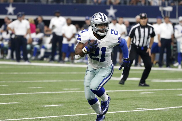 Dallas Cowboys' Ezekiel Elliott (21) carries the ball against the Green Bay Packers during an NFL football game, Sunday, Oct. 8, 2017, in Arlington, Texas. (AP Photo/Michael Ainsworth)