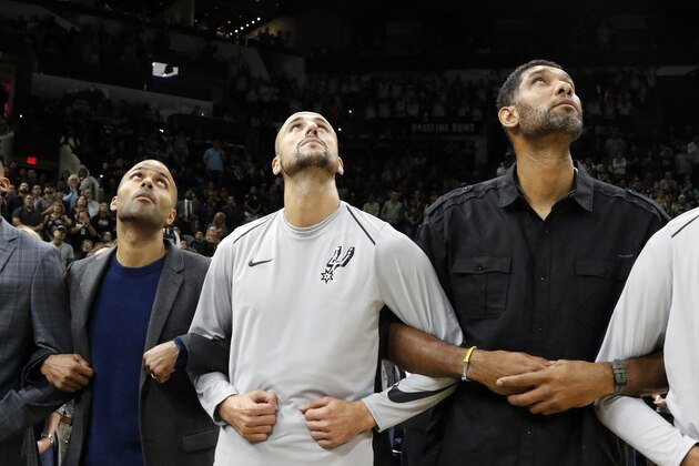 SAN ANTONIO,TX - OCTOBER 18: Injured Tony Parker #9 of the San Antonio Spurs joins Manu Ginobili #20 of the San Antonio Spurs and former great Tim Duncan for pregame activities before game against the Minnesota Timberwolves at AT&T Center on October 18, 2017 in San Antonio, Texas.  NOTE TO USER: User expressly acknowledges and agrees that , by downloading and or using this photograph, User is consenting to the terms and conditions of the Getty Images License Agreement. (Photo by Ronald Cortes/Getty Images)