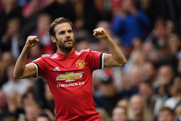 Manchester United's Spanish midfielder Juan Mata celebrates scoring the team's first goal during the English Premier League football match between Manchester United and Crystal Palace at Old Trafford in Manchester, north west England, on September 30, 2017. / AFP PHOTO / Paul ELLIS / RESTRICTED TO EDITORIAL USE. No use with unauthorized audio, video, data, fixture lists, club/league logos or 'live' services. Online in-match use limited to 75 images, no video emulation. No use in betting, games or single club/league/player publications.  /         (Photo credit should read PAUL ELLIS/AFP/Getty Images)