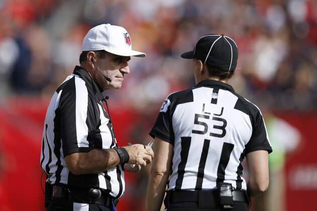 TAMPA, FL - DECEMBER 27: Line judge Sarah Thomas talks with referee Peter Morelli during the game between the Chicago Bears and Tampa Bay Buccaneers at Raymond James Stadium on December 27, 2015 in Tampa, Florida. The Bears defeated the Buccaneers 26-21. (Photo by Joe Robbins/Getty Images)
