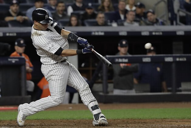 New York Yankees' Gary Sanchez hits a home run during the seventh inning of Game 5 of baseball's American League Championship Series against the Houston Astros Wednesday, Oct. 18, 2017, in New York. (AP Photo/David J. Phillip)