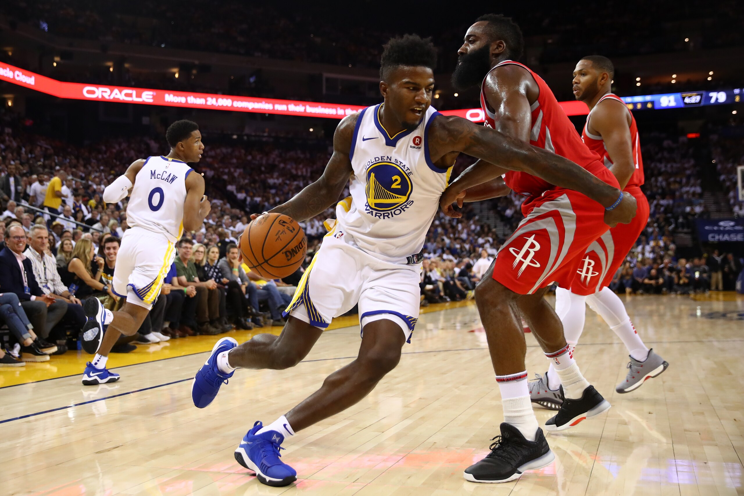 OAKLAND, CA - OCTOBER 17:  Jordan Bell #2 of the Golden State Warriors drives to the hoop against James Harden #13 of the Houston Rockets during their NBA game at ORACLE Arena on October 17, 2017 in Oakland, California. NOTE TO USER: User expressly acknowledges and agrees that, by downloading and or using this photograph, User is consenting to the terms and conditions of the Getty Images License Agreement.  (Photo by Ezra Shaw/Getty Images)