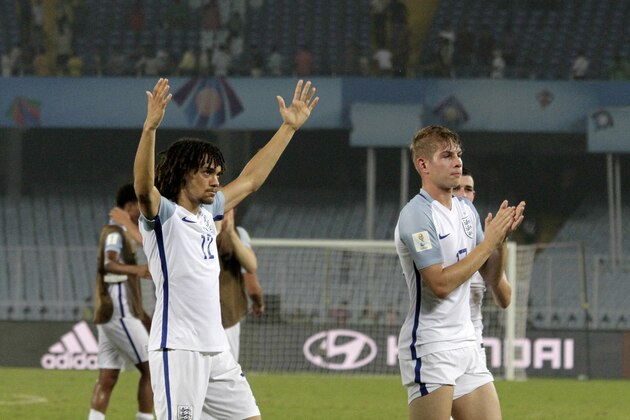 England's Nya Kirby, left, and others acknowledge the crowd as they celebrate their victory against Japan during the FIFA U-17 World Cup match in Kolkata, India, Tuesday, Oct. 17, 2017. (AP Photo/Bikas Das)
