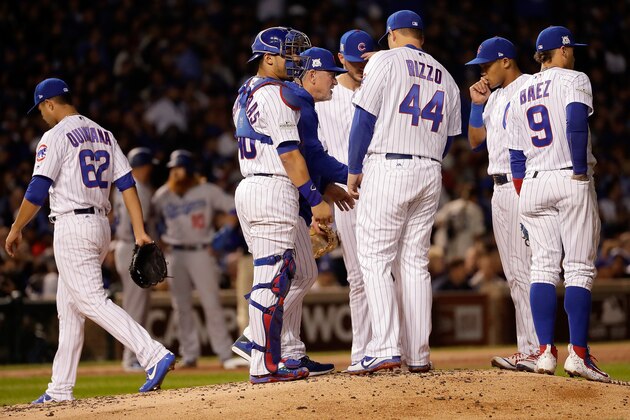 CHICAGO, IL - OCTOBER 19:  Manager Joe Maddon of the Chicago Cubs relieves Jose Quintana #62 in the third inning against the Los Angeles Dodgers during game five of the National League Championship Series at Wrigley Field on October 19, 2017 in Chicago, Illinois.  (Photo by Jamie Squire/Getty Images)