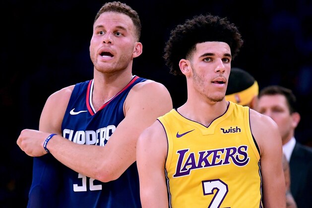 LOS ANGELES, CA - OCTOBER 19:  Lonzo Ball #2 of the Los Angeles Lakers and Blake Griffin #32 of the LA Clippers take the floor during the Los Angeles Lakers home opener at Staples Center on October 19, 2017 in Los Angeles, California.  (Photo by Harry How/Getty Images)