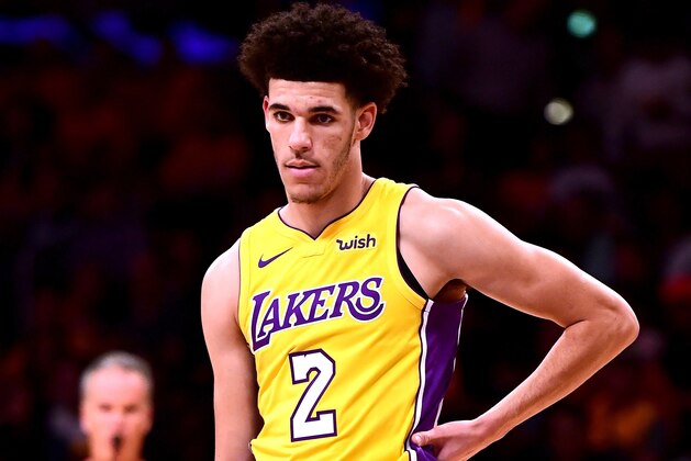 LOS ANGELES, CA - OCTOBER 19:  Lonzo Ball #2 of the Los Angeles Lakers waits on the floor against the LA Clippers during the Los Angeles Lakers home opener at Staples Center on October 19, 2017 in Los Angeles, California.  (Photo by Harry How/Getty Images)