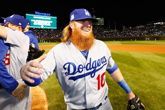 CHICAGO, IL - OCTOBER 19:  Justin Turner #10 of the Los Angeles Dodgers celebrates after defeating the Chicago Cubs 11-1 in game five of the National League Championship Series at Wrigley Field on October 19, 2017 in Chicago, Illinois. The Dodgers advance to the 2017 World Series.  (Photo by Jamie Squire/Getty Images)
