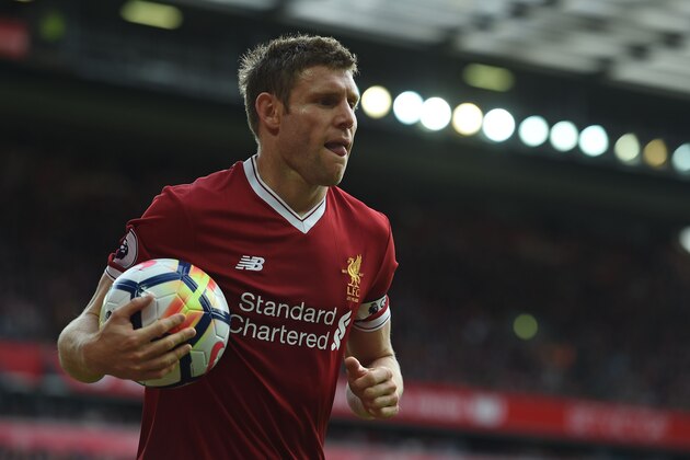 Liverpool's English midfielder James Milner gathers the ball during the English Premier League football match between Liverpool and Burnley at Anfield in Liverpool, north west England on September 16, 2017. / AFP PHOTO / Paul ELLIS / RESTRICTED TO EDITORIAL USE. No use with unauthorized audio, video, data, fixture lists, club/league logos or 'live' services. Online in-match use limited to 75 images, no video emulation. No use in betting, games or single club/league/player publications.  /         (Photo credit should read PAUL ELLIS/AFP/Getty Images)
