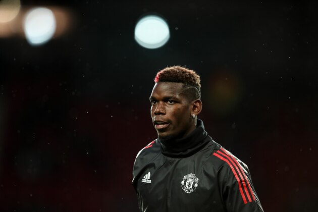 MANCHESTER, ENGLAND - SEPTEMBER 12: Paul Pogba of Manchester United warms up during the UEFA Champions League match between Manchester United and FC Basel at Old Trafford on September 12, 2017 in Manchester, England. (Photo by Robbie Jay Barratt - AMA/Getty Images) MANCHESTER, ENGLAND - SEPTEMBER 12: Paul Pogba of Manchester United warms up during the UEFA Champions League match between Manchester United and FC Basel at Old Trafford on September 12, 2017 in Manchester, England. (Photo by Robbie Jay Barratt - AMA/Getty Images)