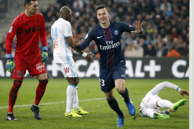 Paris Saint Germain's Julian Draxler, center, celebrates after scoring , during the League One soccer match between Marseille and Paris Saint-Germain, at the Velodrome Stadium, in Marseille, southern France, Sunday, Feb. 26, 2017. (AP Photo/Claude Paris) Paris Saint Germain's Julian Draxler, center, celebrates after scoring , during the League One soccer match between Marseille and Paris Saint-Germain, at the Velodrome Stadium, in Marseille, southern France, Sunday, Feb. 26, 2017. (AP Photo/Claude Paris)