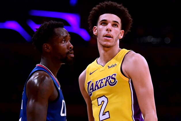 LOS ANGELES, CA - OCTOBER 19:  Lonzo Ball #2 of the Los Angeles Lakers is guarded by Patrick Beverley #21 of the LA Clippers during the first half of the Los Angeles Lakers home opener at Staples Center on October 19, 2017 in Los Angeles, California.  (Photo by Harry How/Getty Images)