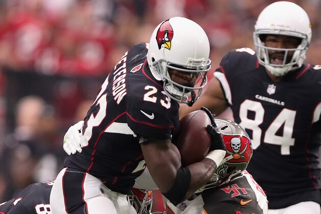 GLENDALE, AZ - OCTOBER 15:  Running back Adrian Peterson #23 of the Arizona Cardinals rushes the football during the  NFL game against the Tampa Bay Buccaneers at the University of Phoenix Stadium on October 15, 2017 in Glendale, Arizona. The Cardinals defeated the  Buccaneers 38-33.  (Photo by Christian Petersen/Getty Images)