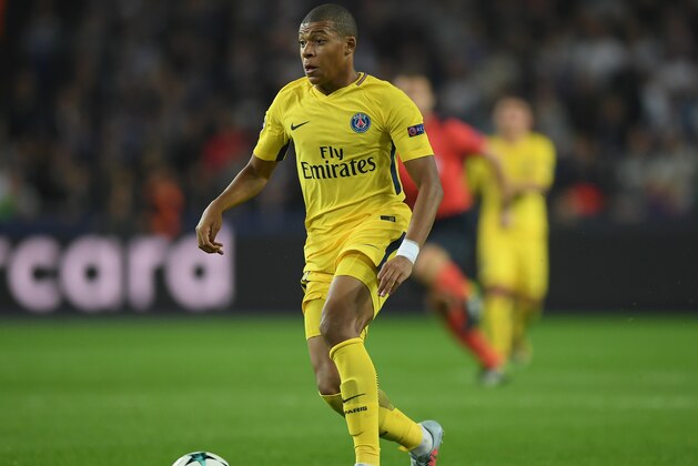 BRUSSELS, BELGIUM - OCTOBER 18:  Kylian Mbappe of Paris Saint-Germain runs with the ball during the UEFA Champions League group B match between RSC Anderlecht and Paris Saint-Germain at Constant Vanden Stock Stadium on October 18, 2017 in Brussels, Belgium.  (Photo by Shaun Botterill/Getty Images)