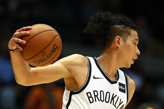 UNIONDALE, NY - OCTOBER 11:  Jeremy Lin #7 of the Brooklyn Nets dribbles against the Philadelphia 76ers during their Pre Season game at Nassau Veterans Memorial Coliseum on October 11, 2017 in Uniondale, New York.   NOTE TO USER: User expressly acknowledges and agrees that, by downloading and/or using this Photograph, user is consenting to the terms and conditions of the Getty Images License Agreement.  (Photo by Al Bello/Getty Images)