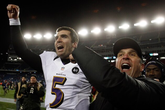 FOXBORO, MA - JANUARY 20:  Head coach John Harbaugh and Joe Flacco #5 of the Baltimore Ravens celebrate after defeating the New England Patriots in the 2013 AFC Championship game at Gillette Stadium on January 20, 2013 in Foxboro, Massachusetts. The Baltimore Ravens defeated the New England Patriots 28-13.  (Photo by Jim Rogash/Getty Images)