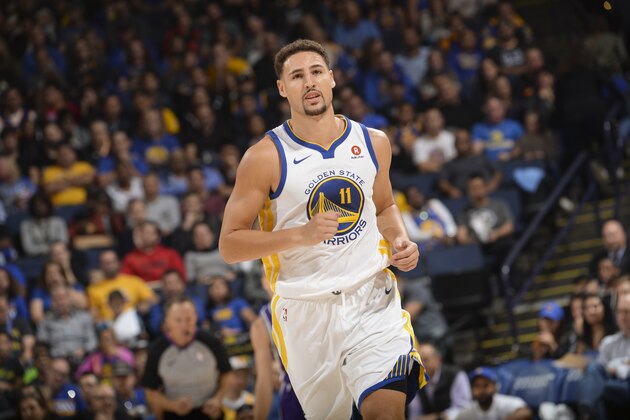 OAKLAND, CA - OCTOBER 13: Klay Thompson #11 of the Golden State Warriors looks on during preseason game against the Sacramento Kings on October 13, 2017 at ORACLE Arena in Oakland, California. NOTE TO USER: User expressly acknowledges and agrees that, by downloading and or using this photograph, user is consenting to the terms and conditions of Getty Images License Agreement. Mandatory Copyright Notice: Copyright 2017 NBAE (Photo by Noah Graham/NBAE via Getty Images)