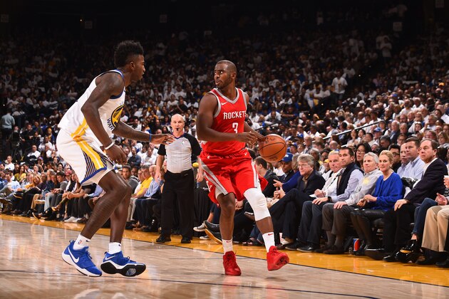 OAKLAND, CA - OCTOBER 17: Chris Paul #3 of the Houston Rockets handles the ball against the Golden State Warriors on October 17, 2017 at ORACLE Arena in Oakland, California. NOTE TO USER: User expressly acknowledges and agrees that, by downloading and or using this photograph, user is consenting to the terms and conditions of Getty Images License Agreement. Mandatory Copyright Notice: Copyright 2017 NBAE (Photo by Noah Graham/NBAE via Getty Images)