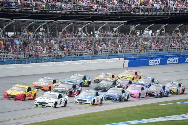 TALLADEGA, AL - OCTOBER 15:  Brad Keselowski, driver of the #2 Miller Lite Ford, and Joey Logano, driver of the #22 Shell Pennzoil Ford, lead a pack of cars during the Monster Energy NASCAR Cup Series Alabama 500 at Talladega Superspeedway on October 15, 2017 in Talladega, Alabama.  (Photo by Jared C. Tilton/Getty Images)