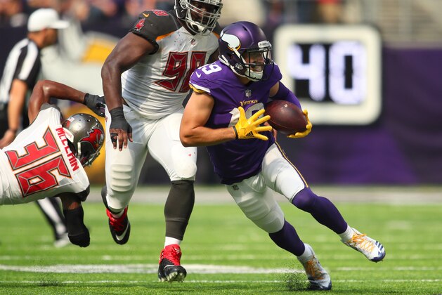 MINNEAPOLIS, MN - SEPTEMBER 24: Adam Thielen #19 of the Minnesota Vikings carries the ball in the first half of the game against the Tampa Bay Buccaneers on September 24, 2017 at U.S. Bank Stadium in Minneapolis, Minnesota. (Photo by Adam Bettcher/Getty Images)