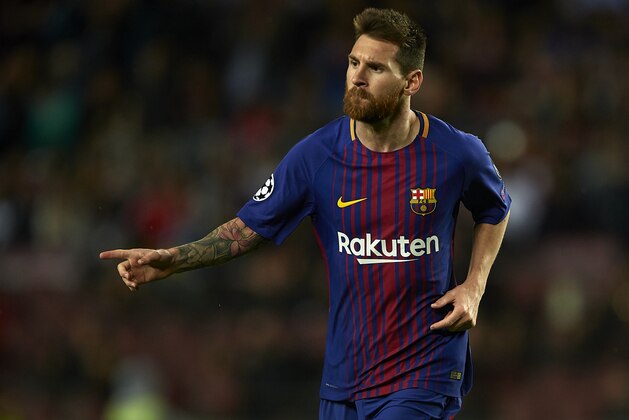 BARCELONA, SPAIN - OCTOBER 18:  Lionel Messi of Barcelona celebrates scoring his team's second goal during the UEFA Champions League group D match between FC Barcelona and Olympiakos Piraeus at Camp Nou on October 18, 2017 in Barcelona, Spain.  (Photo by Manuel Queimadelos Alonso/Getty Images)