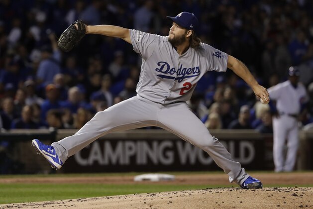 Los Angeles Dodgers starting pitcher Clayton Kershaw (22) throws during the first inning of Game 5 of baseball's National League Championship Series against the Chicago Cubs, Thursday, Oct. 19, 2017, in Chicago. (AP Photo/Matt Slocum)