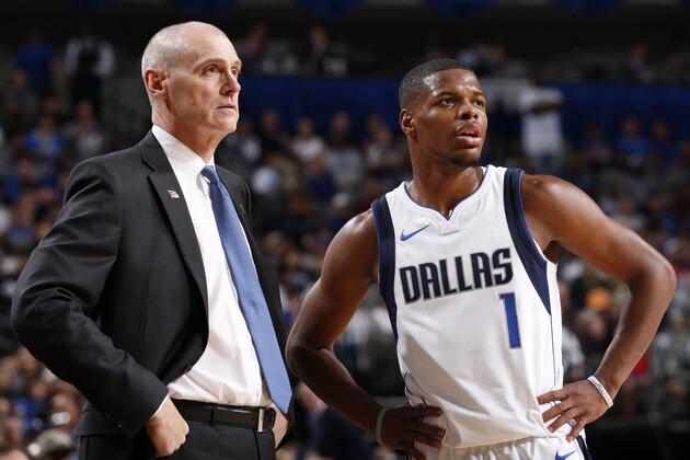 DALLAS, TX - OCTOBER 18: Rick Carlisle and Dennis Smith Jr. #1 of the Dallas Mavericks look on during the game against the Atlanta Hawks at the American Airlines Center in Dallas, Texas on October 18, 2017. NOTE TO USER: User expressly acknowledges and agrees that, by downloading and/or using this photograph, user is consenting to the terms and conditions of the Getty Images License Agreement. Mandatory Copyright Notice: Copyright 2017 NBAE (Photo by Glenn James/NBAE via Getty Images)