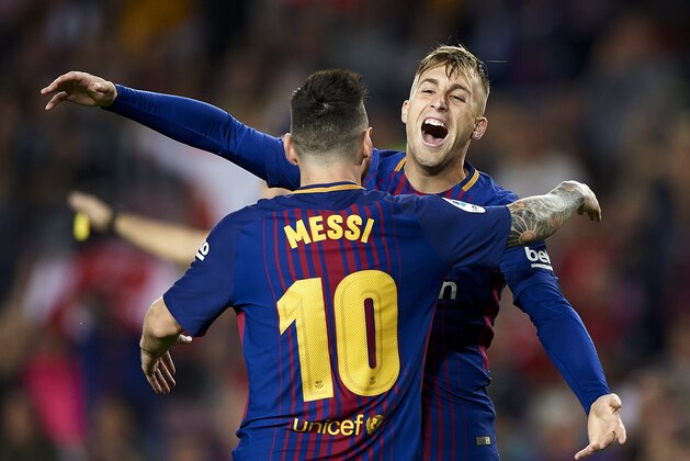 BARCELONA, SPAIN - OCTOBER 21:  Gerard Deulofeu (R) of Barcelona celebrates with Lionel Messi of Barcelona after scoring the first goal during the La Liga match between Barcelona and Malaga at Camp Nou on October 21, 2017 in Barcelona, Spain.  (Photo by fotopress/Getty Images)