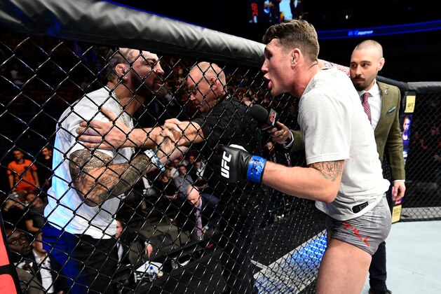 GDANSK, POLAND - OCTOBER 21:  (R-L) Darren Till of England has words with Mike Perry after his victory over Donald Cerrone during the UFC Fight Night event inside Ergo Arena on October 21, 2017 in Gdansk, Poland. (Photo by Jeff Bottari/Zuffa LLC/Zuffa LLC via Getty Images)