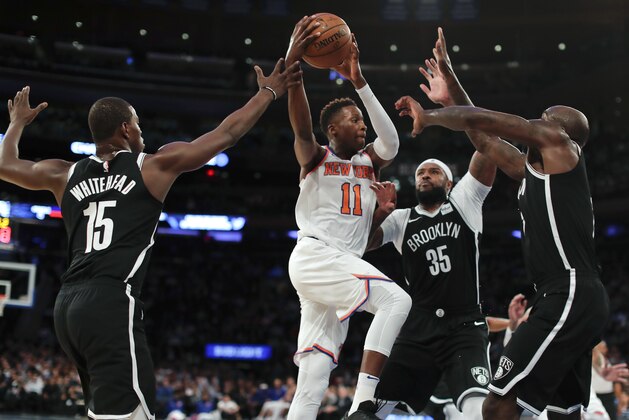 New York Knicks guard Frank Ntilikina (11) drives against the Brooklyn Nets during the third quarter of a preseason NBA basketball game Tuesday, Oct. 3, 2017, in New York. The Nets won 115-107. (AP Photo/Julie Jacobson)
