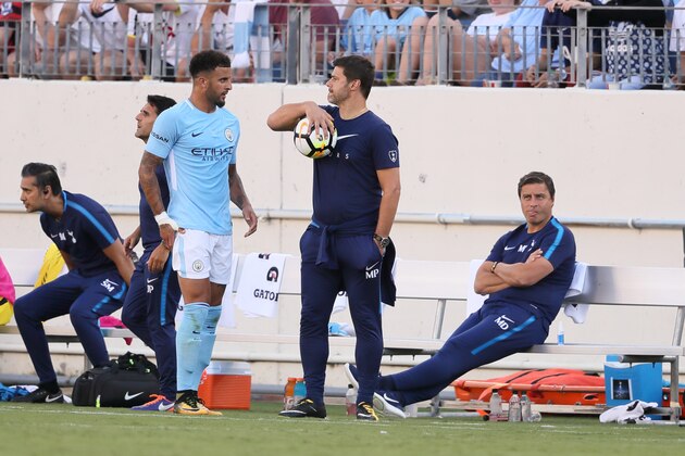 NASHVILLE, TN - JULY 29: Mauricio Pochettino the head coach / manager of Tottenham Hotspur gives the ball to Kyle Walker of Manchester City during the International Champions Cup 2017 match between Manchester City and  Tottenham Hotspur at Nissan Stadium on July 29, 2017 in Nashville, Tennessee. (Photo by Matthew Ashton - AMA/Getty Images)