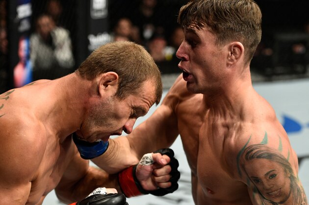 GDANSK, POLAND - OCTOBER 21:  (R-L) Darren Till of England punches Donald Cerrone in their welterweight bout during the UFC Fight Night event inside Ergo Arena on October 21, 2017 in Gdansk, Poland. (Photo by Jeff Bottari/Zuffa LLC/Zuffa LLC via Getty Images)