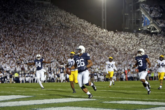 STATE COLLEGE, PA - OCTOBER 21:  Saquon Barkley #26 of the Penn State Nittany Lions rushes for a 69 yard touchdown in the first half against the Michigan Wolverines on October 21, 2017 at Beaver Stadium in State College, Pennsylvania.  (Photo by Justin K. Aller/Getty Images)