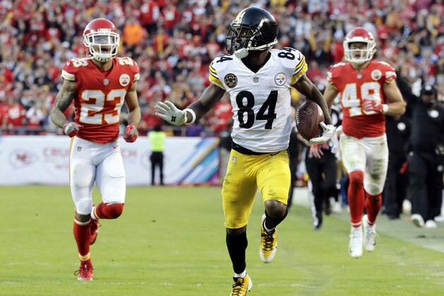 Pittsburgh Steelers wide receiver Antonio Brown (84) runs for a touchdown ahead of Kansas City Chiefs defensive back Phillip Gaines (23) during the second half of an NFL football game against the Kansas City Chiefs in Kansas City, Mo., Sunday, Oct. 15, 2017. (AP Photo/Charlie Riedel)
