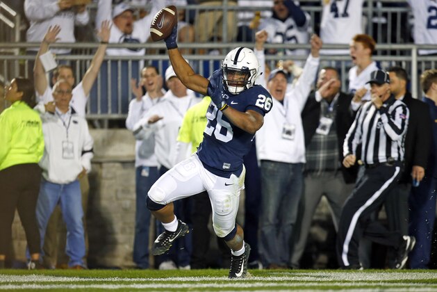 STATE COLLEGE, PA - OCTOBER 21:  Saquon Barkley #26 of the Penn State Nittany Lions celebrates after catching a 42 yard touchdown pass in the second half against the Michigan Wolverines on October 21, 2017 at Beaver Stadium in State College, Pennsylvania.  (Photo by Justin K. Aller/Getty Images)