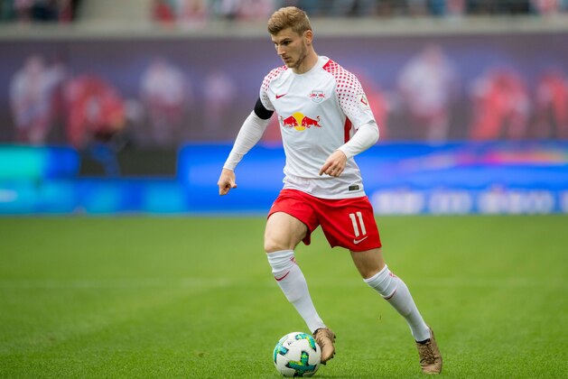 Leipzig's German forward Timo Werner plays the ball during the German first division Bundesliga football match between RB Leipzig and VfB Stuttgart in Leipzig, eastern Germany on October 21, 2017.  / AFP PHOTO / ROBERT MICHAEL / RESTRICTIONS: DURING MATCH TIME: DFL RULES TO LIMIT THE ONLINE USAGE TO 15 PICTURES PER MATCH AND FORBID IMAGE SEQUENCES TO SIMULATE VIDEO. == RESTRICTED TO EDITORIAL USE == FOR FURTHER QUERIES PLEASE CONTACT DFL DIRECTLY AT + 49 69 650050
        (Photo credit should read ROBERT MICHAEL/AFP/Getty Images)