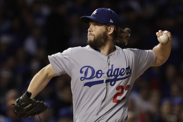 Los Angeles Dodgers starting pitcher Clayton Kershaw (22) throws during the first inning of Game 5 of baseball's National League Championship Series against the Chicago Cubs, Thursday, Oct. 19, 2017, in Chicago. (AP Photo/Matt Slocum)