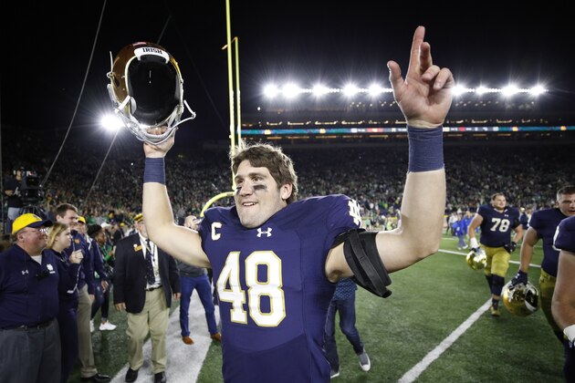 SOUTH BEND, IN - OCTOBER 21: Greer Martini #48 of the Notre Dame Fighting Irish celebrates after a 49-14 win against the USC Trojans at Notre Dame Stadium on October 21, 2017 in South Bend, Indiana. (Photo by Joe Robbins/Getty Images)