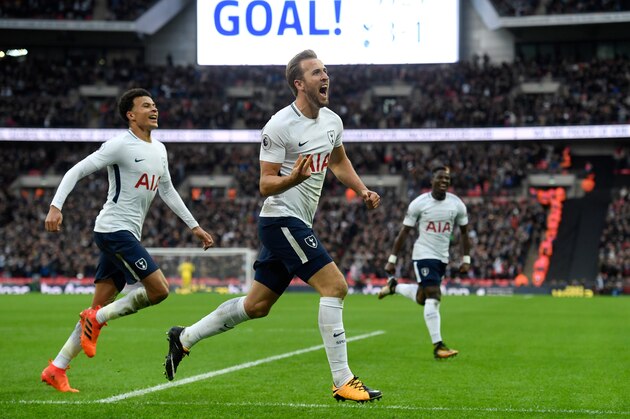 LONDON, ENGLAND - OCTOBER 22:  Harry Kane of Spurs (r) celebrates with Dele Ali after scoring the fourth goal and his second of the game during the Premier League match between Tottenham Hotspur and Liverpool at Wembley Stadium on October 22, 2017 in London, England.  (Photo by Stu Forster/Getty Images)