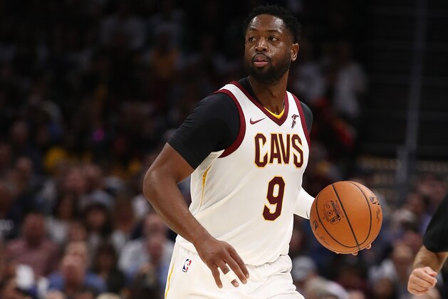 CLEVELAND, OH - OCTOBER 17:  Dwyane Wade #9 of the Cleveland Cavaliers brings the ball up the court while playing the Boston Celtics at Quicken Loans Arena on October 17, 2017 in Cleveland, Ohio. NOTE TO USER: User expressly acknowledges and agrees that, by downloading and or using this photograph, User is consenting to the terms and conditions of the Getty Images License Agreement.  (Photo by Gregory Shamus/Getty Images)