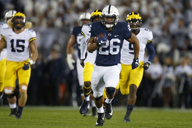 STATE COLLEGE, PA - OCTOBER 21:  Saquon Barkley #26 of the Penn State Nittany Lions rushes for a 69 yard touchdown in the first half against the Michigan Wolverines on October 21, 2017 at Beaver Stadium in State College, Pennsylvania.  (Photo by Justin K. Aller/Getty Images)