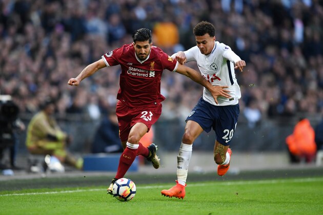 LONDON, ENGLAND - OCTOBER 22:  Emre Can of Liverpool and Dele Alli of Tottenham Hotspur battle for possession during the Premier League match between Tottenham Hotspur and Liverpool at Wembley Stadium on October 22, 2017 in London, England.  (Photo by Shaun Botterill/Getty Images)